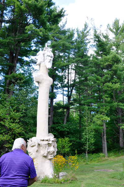 Lee Duquette and a tall sculpture at Brunel Sculpture Park